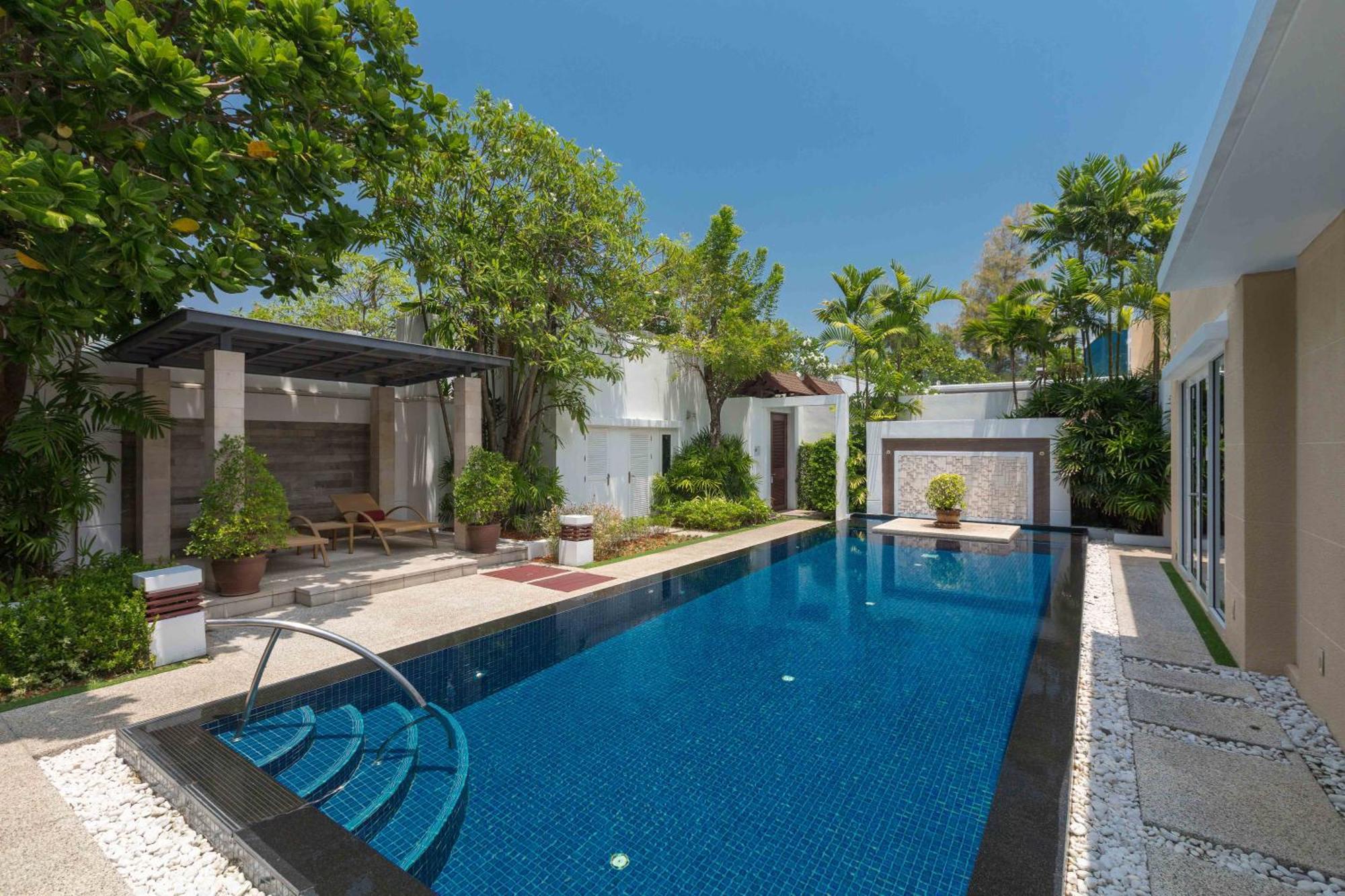 Splash Beach Resort, Maikhao Phuket - Sha Extra Plus Mai Khao Ngoại thất bức ảnh The swimming pool at the residence